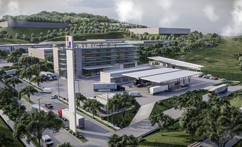 Vista aérea del Polígono Logístico e Industrial Cubika Caribe en Cartagena, con camiones y edificios modernos. Servicios de arquitectura, BIM y consultoría logística por Dinpro.