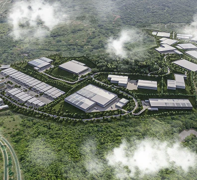 Vista aérea de un parque industrial moderno con edificios y áreas verdes, ideal para iniciar tu proyecto con Dinpro. Desarrollo de proyectos industriales y comerciales.